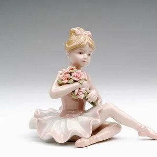 Porcelain Ballerina in Pink Dress Sitting